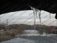 Ice forms on the underside of a bridge Ice forms on the underside of a bridge