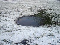 Un-frozen puddle Un-frozen puddle