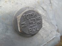 One of the thousands of bolts used to hold the safety barriers in place One of the thousands of bolts used to hold the safety barriers in place