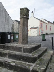 A very old looking market cross in Ireby A very old looking market cross in Ireby