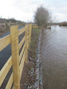 Path repaired with new wall and fence Path repaired with new wall and fence