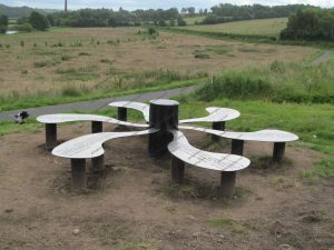 The information henge is positioned on Cummersdale Holmes overlooking the River Caldew on the outskirts of the City of Carlisle The information henge is positioned on Cummersdale Holmes overlooking the River Caldew on the outskirts of the City of Carlisle