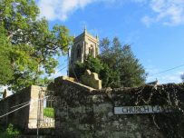 Thursby church set against a blue sky