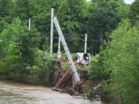 Overhead gantry collapses into River Caldew during 2012
