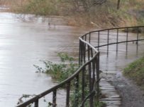 River Eden floods path behind Willowholme Industrial Estate