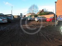 A thick layer of sludge left in Caldewgate after Carlisle floods in 2005