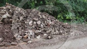 Debris, old bricks, big stones and gravel