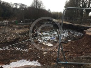 Electricity cables are exposed now the flood defences have collapsed